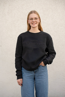 Pullover in der Farbe schwarz mit gestanzter Böckmann Raute.